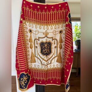 Red & gold silk scarf with intricate design. Size 30’ square.